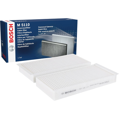 1987435110 - M5110,"Bosch Cabin Air Pollen Filter model 1987435110 (M5110), rectangular automotive air filter with pleated white filtration material and black frame, designed to remove pollen, dust, and other airborne particles from vehicle interiors."