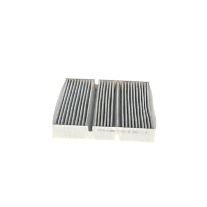 1987435609 - R5609,"Bosch Cabin Air Pollen Filter model 1987435609 (R5609), rectangular automotive air filter with pleated white filtration material and black frame, designed to remove pollen, dust, and other airborne particles from vehicle interiors."