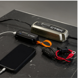 CTEK MXS 5.0 smart battery charger kit, maintains and charges car and motorcycle batteries efficiently.